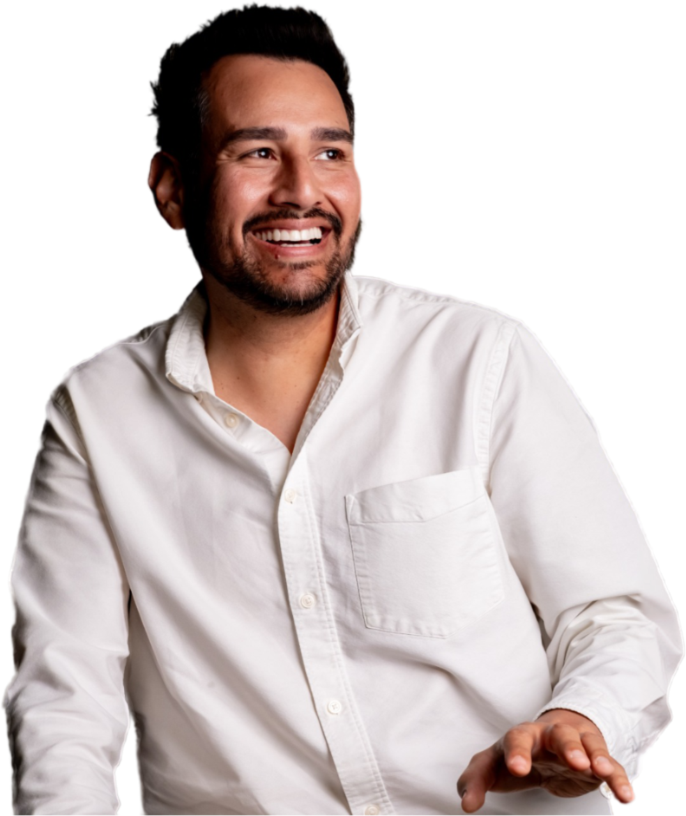 Pedro Villegas smiling in a white shirt